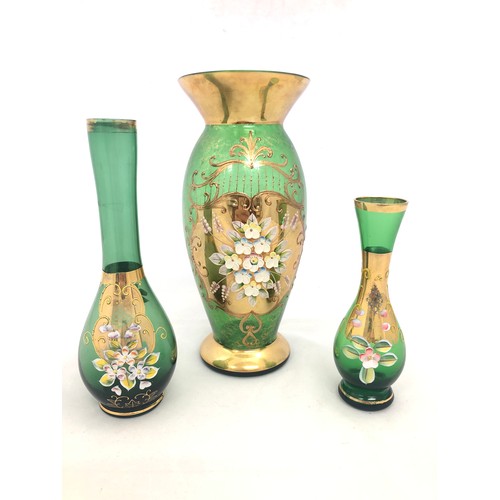 310 - Bohemian Glass – Three green vases with floral design and gilt finish.