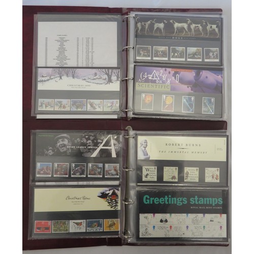 30 - 1990’s (1991-1999) unmounted mint commemorative presentation pack collection in two Royal Mail binde... 