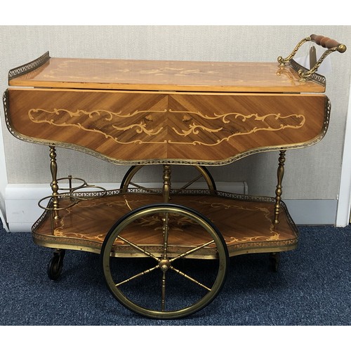 236 - Furniture -  An inlaid Sorrento style drinks trolley with drop leaf sides and two tiers.