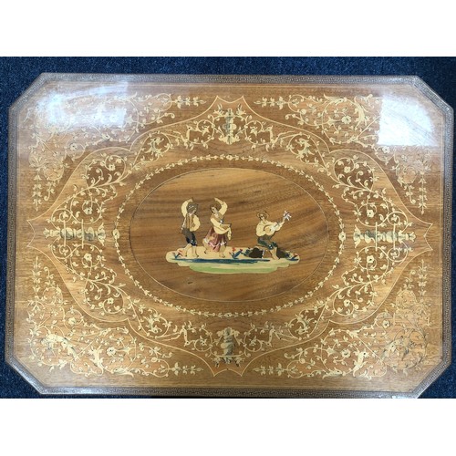 206 - A Sorrento ware inlaid music box table. Some wear to the table surface.  Musical mechanism is in wor... 