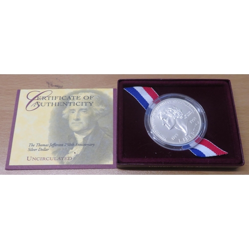 322 - The Thomas Jefferson 1993 Uncirculated 250th anniversary silver dollar in case with box and COA.