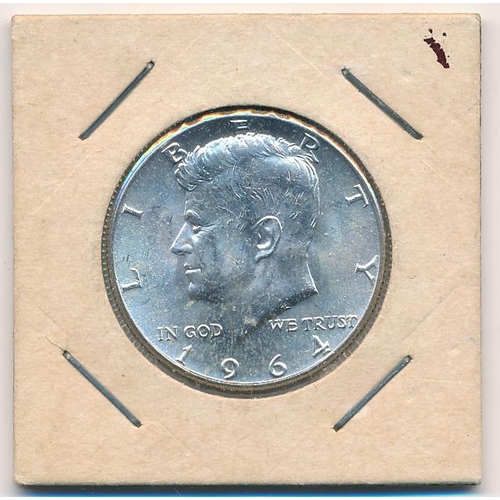 323 - USA 1964 silver half dollar, about uncirculated.