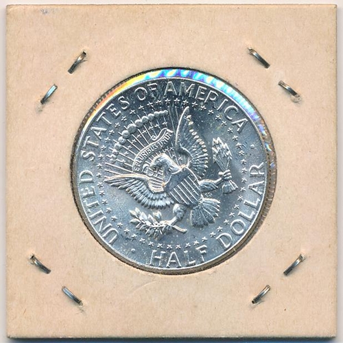 324 - USA 1964 Silver half dollar, about uncirculated.