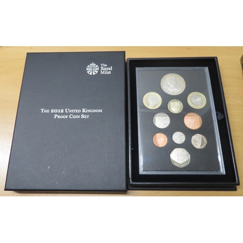 256 - 2012 UK proof set of ten coins by The Royal Mint, black book edition with box, aFDC with some light ... 