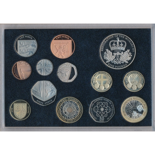 251 - 2010 UK deluxe proof coin set of 13 coins by The Royal Mint, black leather edition, with booklet.