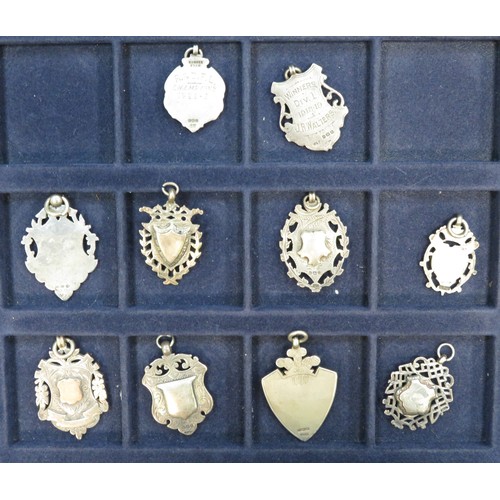 130 - Range of hallmarked silver shield fobs (10), one with 