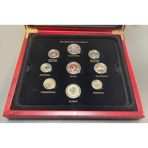 212 - Collection of gold plated and coloured coin sets with 