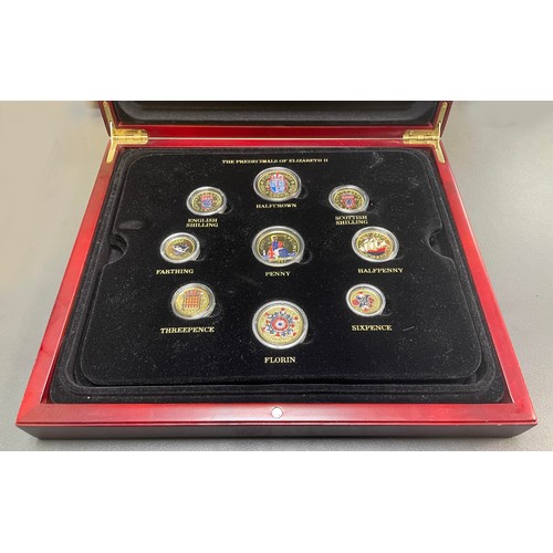 212 - Collection of gold plated and coloured coin sets with 