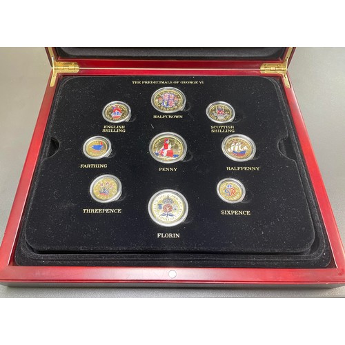 212 - Collection of gold plated and coloured coin sets with 