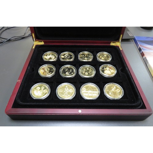 329 - Collection of commemorative sets with TDC set of 24 gold plated crowns commemorating the Royal Famil... 