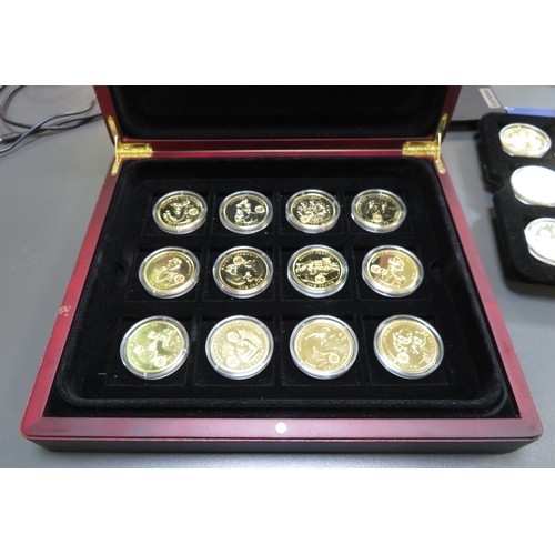 329 - Collection of commemorative sets with TDC set of 24 gold plated crowns commemorating the Royal Famil... 