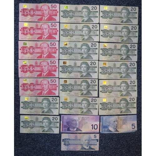 341A - Canadian banknotes (22), in mixed condition with ranges of $50 (5), $20 (14), $10 (1) and $5 (2). Qt... 