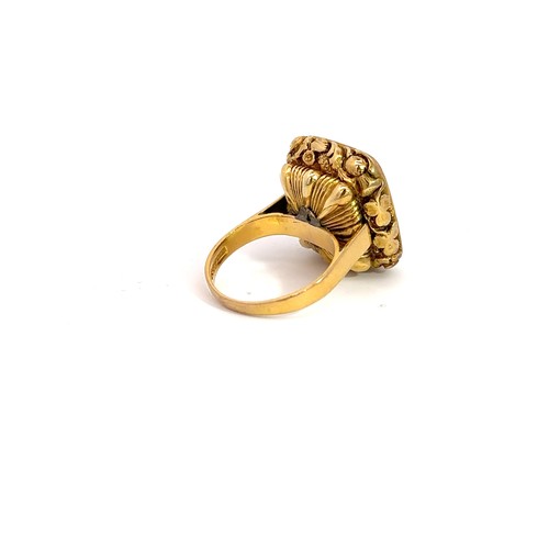 15 - A 9ct gold and citrine ring with Birmingham hallmarks. Citrine is 19mm x 16mm and is high clarity. S... 