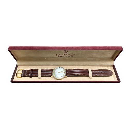 92 - A Martin Revue 1960s 9ct gold watch in case. Mechaninal movement, baton numerals. Watch is in workin... 