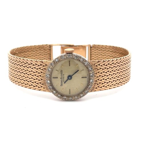 90 - A Berney-Blondeau Geneve ladies gold and diamond watch. Watch is ticking.