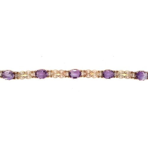 53 - Amethyst fancy link bracelet -  5 amethysts set in a 9ct gold bracelet - hallmarked.  Amethyst are o... 