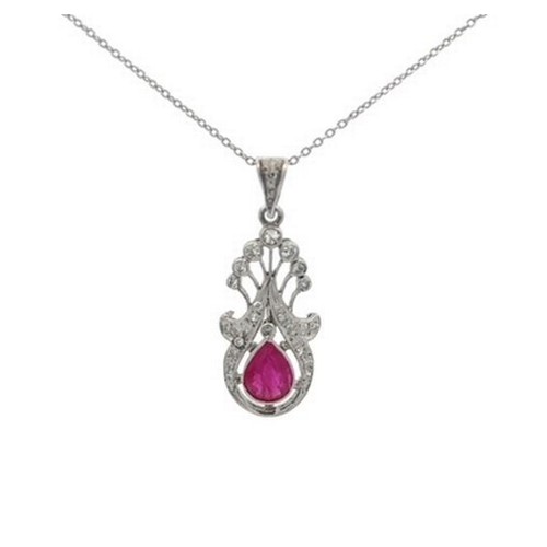 38A - A ruby and diamond openwork pendant suspended from an 18ct white gold chain. Length of pendant:  3.3... 