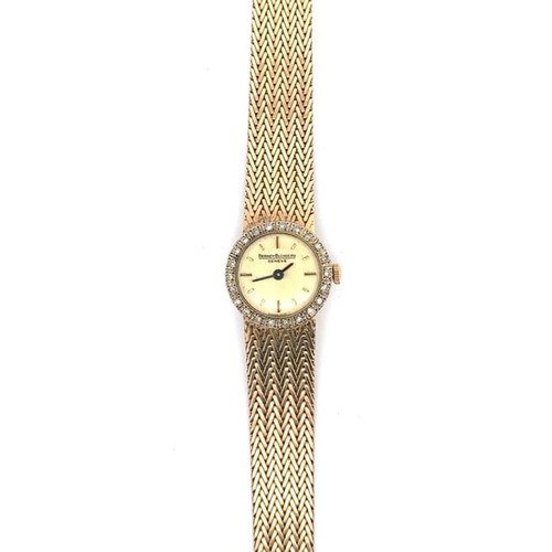 90 - A Berney-Blondeau Geneve ladies gold and diamond watch. Watch is ticking.