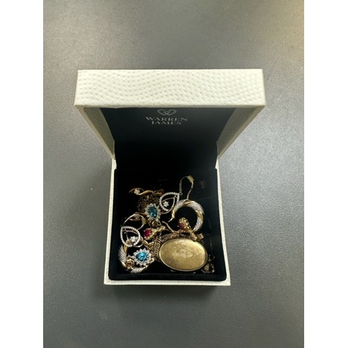 49 - A collection of sterling silver and 9ct gold jewellery items, mostly boxed. Including topaz earrings... 