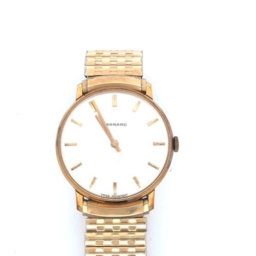 141 - Garrard gold plated gentleman's watch with Swiss movement. Watch is ticking.