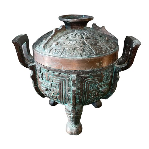 123 - Chinese 20th Century Ice Bucket after James Mont, cast iron with a faux bronze patina. Detailed patt... 