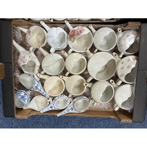 328 - Ceramics. Collection of 38 invalid feeders, with Red Cross (8), Johannesburg Hospital (1), 