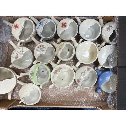 328 - Ceramics. Collection of 38 invalid feeders, with Red Cross (8), Johannesburg Hospital (1), 