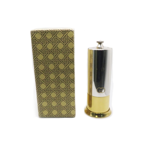 106 - Gucci – A vintage Gucci Pepper Mill/Salt Shaker, in a silver & gold metal finish with GG logo engrav... 