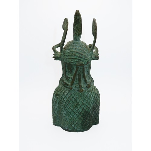 72 - An African mid 20th Century bronze Oba (King) head sculpture, green patina all over. Height 19.5cm.