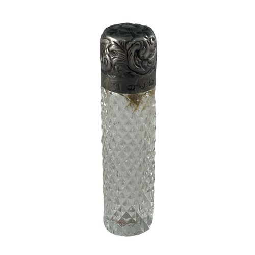 315 - A Victorian miniature cylindrical scent bottle with diamond cut glass, silver screw lid with foliate... 