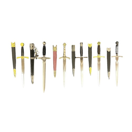 147 - Small collection of six reproduction daggers, six being boxed including Nazi dagger with eagle handl... 