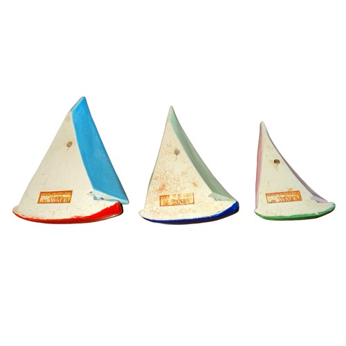 44 - Wade (Ireland) porcelain scarce set of three flat-backed Yacht/Sailing Boat figures in descending si... 