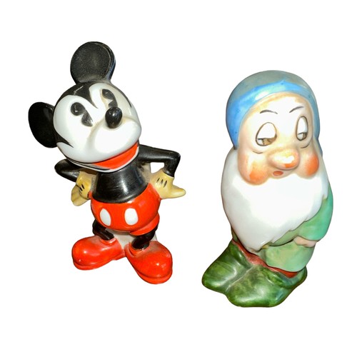 321 - A pair of 1930’s Walt Disney novelty ceramic toothbrush holders, with Mickey Mouse stamped Genuine W... 