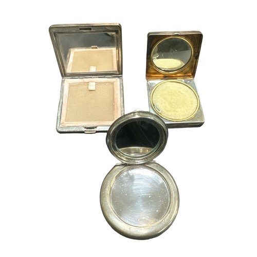 191 - Three makeup compacts, two of which being hallmarked silver to include; art deco square shaped silve... 