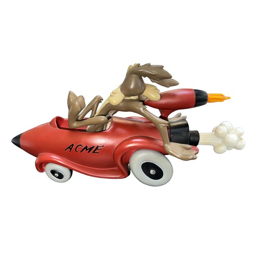 68 - Wile E Coyote in rocket car resin figurine.