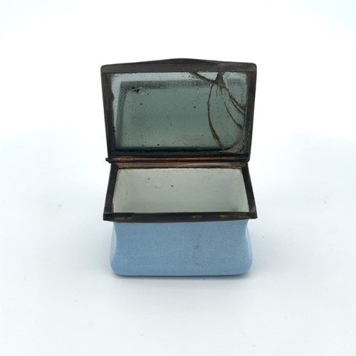 54 - A late 18th/early 19th century Battersea/ Bilston blue rectangular enamel patch box. Hinged lid with... 