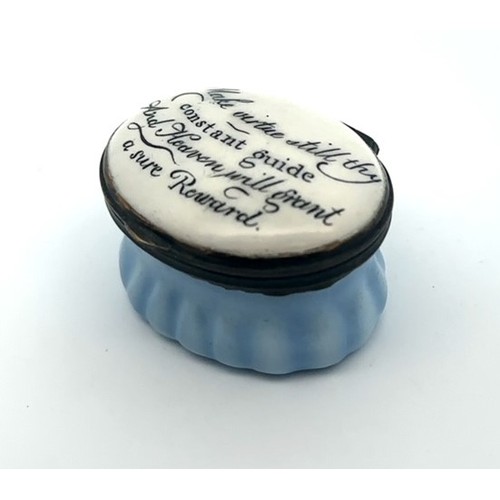 56 - An oval Bilston enamal patch box with blue fluted base and monochrome hinged lid with motto 'Make vi... 