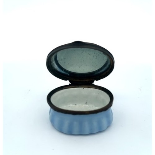 56 - An oval Bilston enamal patch box with blue fluted base and monochrome hinged lid with motto 'Make vi... 