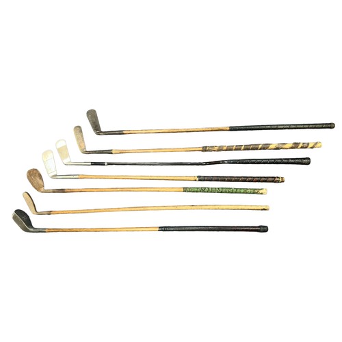 155 - A selection of seven old mostly hickory (6) golf clubs to include; Mashie N Blick with autograph B.E... 