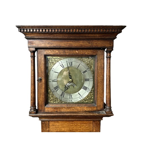 90 - A George III, oak long case clock by John Agar of York.  Flat hood, silvered chapter ring with Roman... 