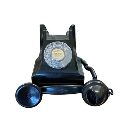 100 - A vintage black Bakerlite telephone, D.62099.