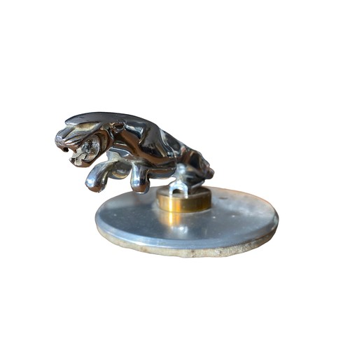 12 - Jaguar – A leaping Jaguar car mascot on round base. Mascot measures 19cm.