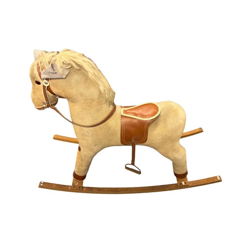 140 - A cord covered rocking horse.