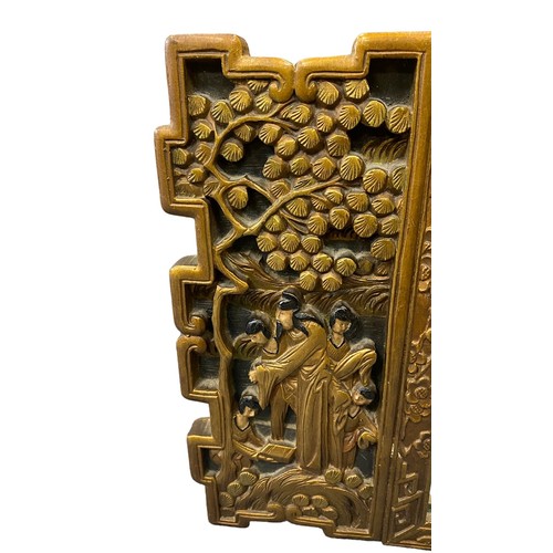 120 - A Chinese early 20th century carved wood wall mirror with carved figure design to either side. Flora... 