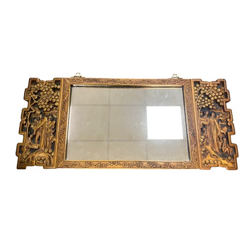 120 - A Chinese early 20th century carved wood wall mirror with carved figure design to either side. Flora... 