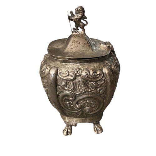 221 - Jones & Crompton 1906 silver tea caddy with rampant lion holding shield to lid, weight 180g.