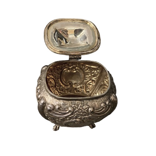 221 - Jones & Crompton 1906 silver tea caddy with rampant lion holding shield to lid, weight 180g.