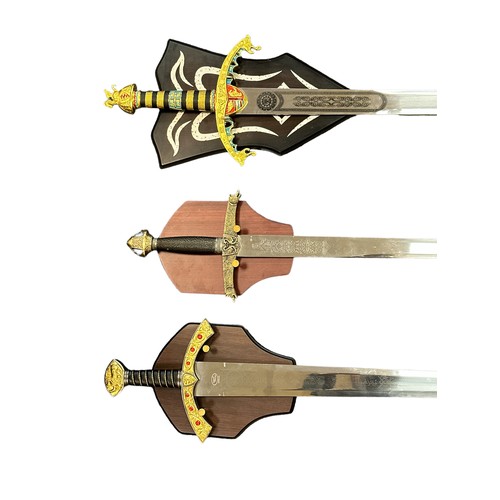 145 - King Arthur – A selection of replica King Arthur swords to include a Lancelot large reproduction sta... 