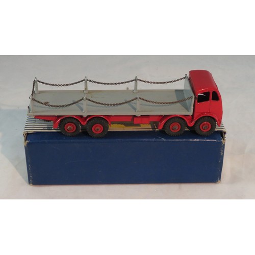 260 - Dinky. Foden Flat Truck with Chains No. 905, generally excellent in good blue and white striped lift... 