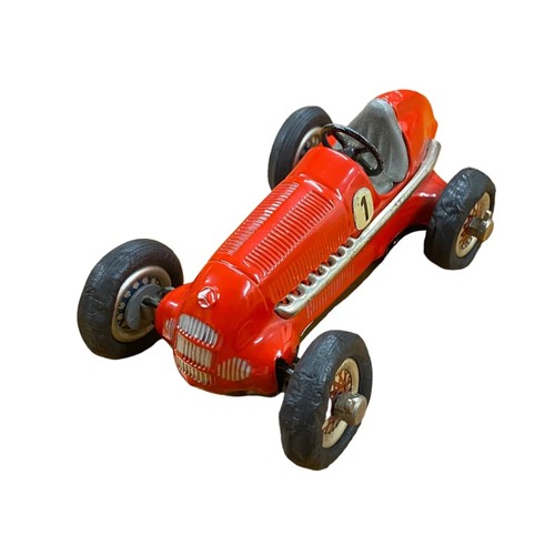 111 - Schuco. Studio red racing car No. 1050, clockwork with key, generally excellent (deformed rubber tyr... 